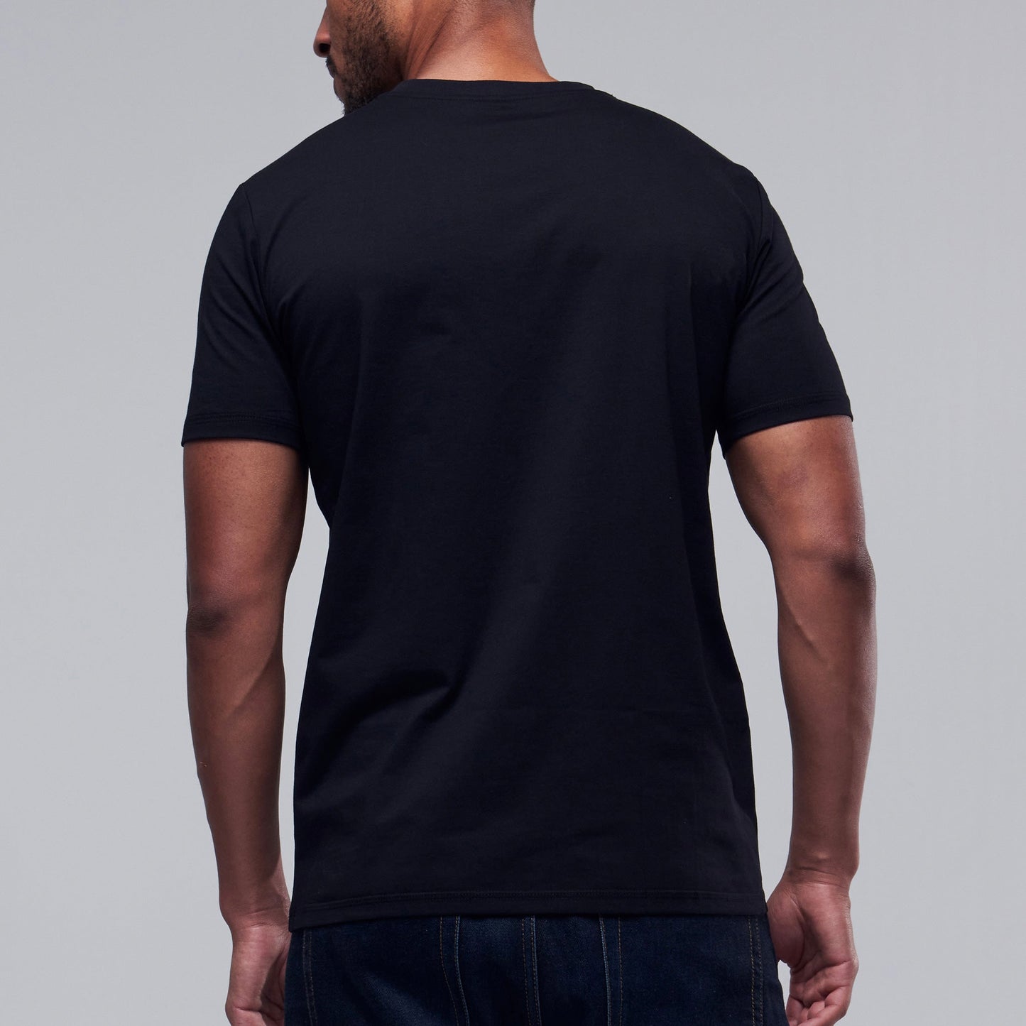 Men's black tech T-shirt lifestyle view